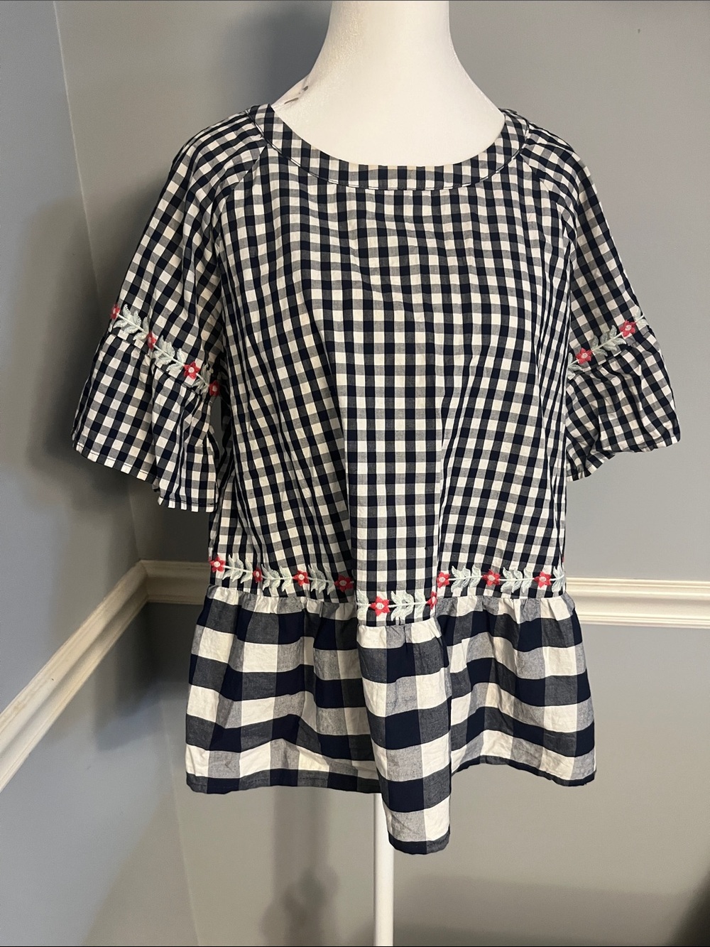 The Impeccable Pig Navy and White Gingham Peplum Top with Pink Floral Embroidery